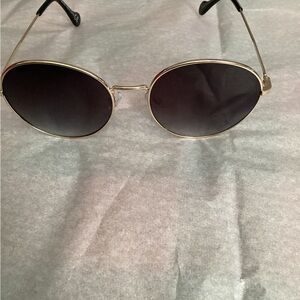 Elegant Gold Frame Sunglasses with Black Lenses